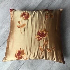 Decorative gold tone pillow